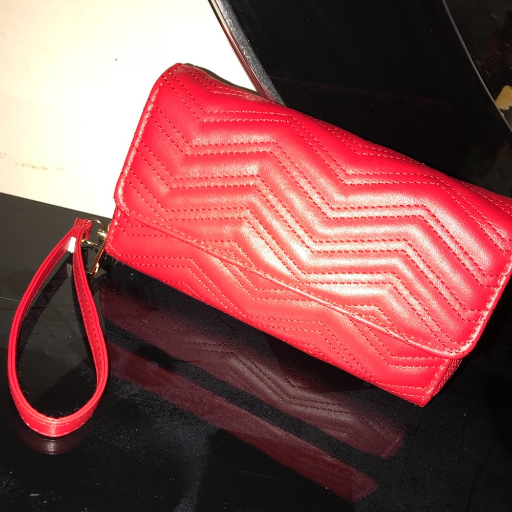 New never used. Red wrist bag